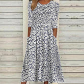 Springstil® - Navy blue midi dress with daisy print and side pockets