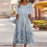 SpringStil® - Blue midi dress with short sleeves and print